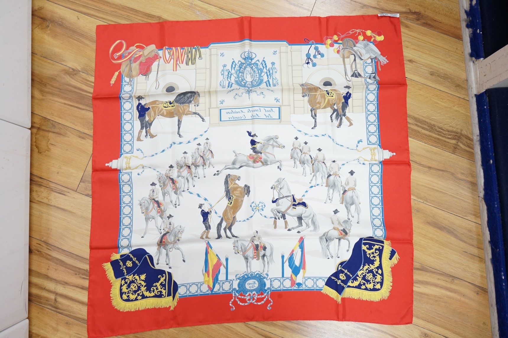 Two boxed Hermes silk scarves comprising ‘Real Escuela Andaluza del Arte Equestre’ and ‘Equateur’, with original boxes, together with four Hermes gentleman’s silk ties